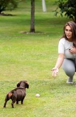LAUREN GOODGER Playing with Her Do at a Park in Essex 07/27/2020