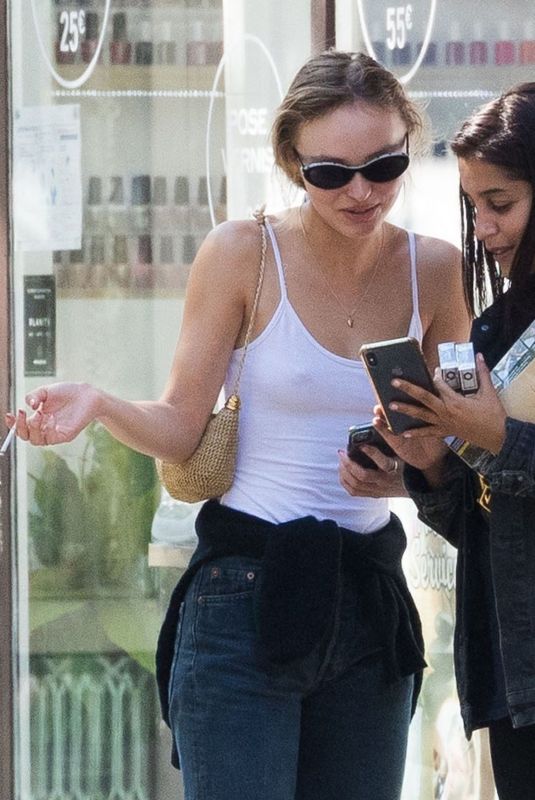 LILY-ROSE DEPP and LEILA BEKHTI at Cafe Quartier General in Paris 07/20/2020