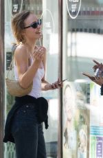 LILY-ROSE DEPP and LEILA BEKHTI at Cafe Quartier General in Paris 07/20/2020