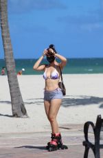 LISA OPIE in Bikini Top and Shorts Roller Blading in Miami 07/29/2020