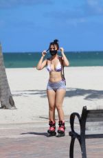 LISA OPIE in Bikini Top and Shorts Roller Blading in Miami 07/29/2020