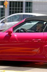 MICHELLE HUNZIKER Drives Her Pink Porsche Out in Milan 07/28/2020