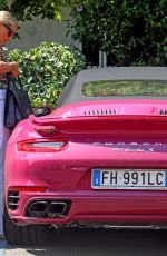 MICHELLE HUNZIKER Drives Her Pink Porsche Out in Milan 07/28/2020