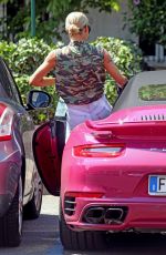 MICHELLE HUNZIKER Drives Her Pink Porsche Out in Milan 07/28/2020