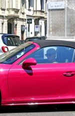 MICHELLE HUNZIKER Drives Her Pink Porsche Out in Milan 07/28/2020