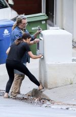 MINKA KELLY Putting a Mailbox Outside Her Home in Los Angeles 07/13/2020