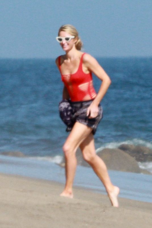PARIS HILTON in a Red Swimsuit on the Beach in Malibu 07/27/2020