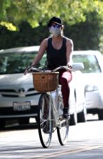 REESE WITHERSPOON Out Riding a Bike in Brentwood 07/11/2020