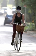 REESE WITHERSPOON Out Riding a Bike in Brentwood 07/11/2020