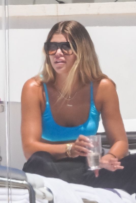 SOFIA RICHIE in Bikini Top on a Balcony in Malibu 07/16/2020