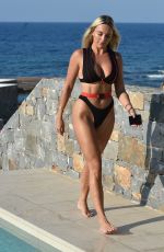 AMBER TURNER in BIkini at a Pool in Crete 08/29/2020