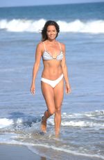 BROOKE BURKE in Bikini Filming Her Body App at a Beach in Malibu 08/10/2020