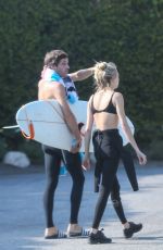 CARA DELEVINGNE in Wetsuit Out Surfing in Malibu 08/18/2020