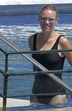 CAROLINE WOZNIACKI in a Black Swimsuit at a Pool in Italy 08/10/2020