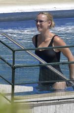CAROLINE WOZNIACKI in a Black Swimsuit at a Pool in Italy 08/10/2020