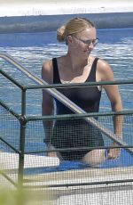 CAROLINE WOZNIACKI in a Black Swimsuit at a Pool in Italy 08/10/2020