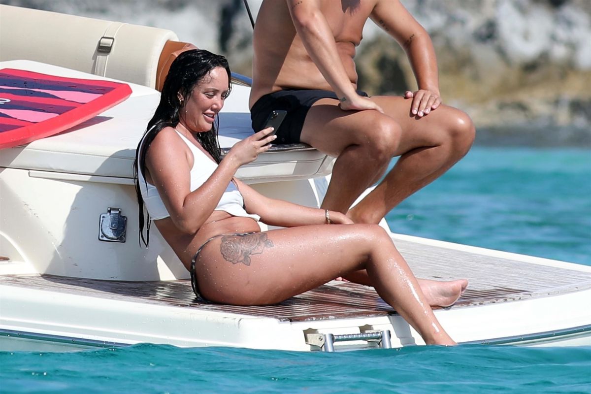 CHARLOTTE CROSBY in Bikini at a Boat in Formentera 08/03/2020.