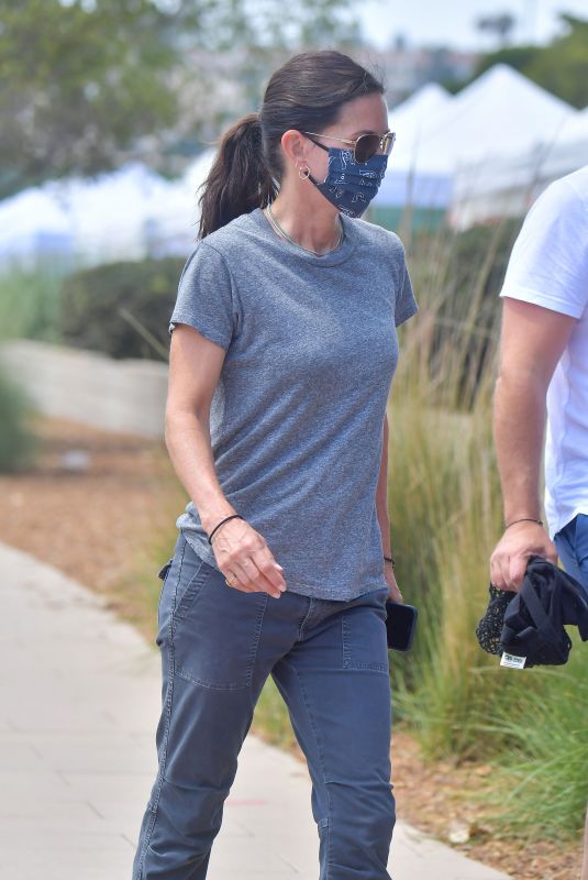 COURTENEY COX Wearing a Mask Out in Malibu 08/23/2020