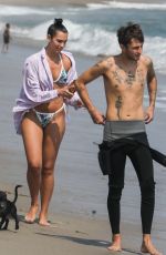 DUA LIPA in Bikini and Anwar Hadid Out with Their Dog at a Beach in Malibu 08/25/2020