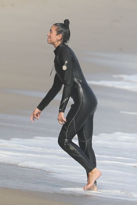 DUA LIPA in Wetsuit Boogie Boarding in Malibu 08/21/20