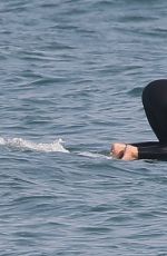 DUA LIPA in Wetsuit Boogie Boarding in Malibu 08/21/20