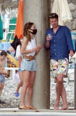 EMILIA CLARKE at a Restaurant on Vacation in Positano 08/07/2020