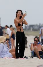 EMILY RATAJKOWSKI in Bikini Top on the Beach in Hamptons 08/25/2020