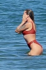 IRELAND BALDWIN in a Red Swimsuit at a Beach in Malibu 07/31/2020