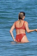 IRELAND BALDWIN in a Red Swimsuit at a Beach in Malibu 07/31/2020