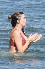 IRELAND BALDWIN in a Red Swimsuit at a Beach in Malibu 07/31/2020