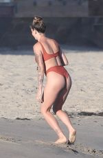 IRELAND BALDWIN in a Red Swimsuit at a Beach in Malibu 07/31/2020