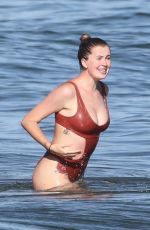 IRELAND BALDWIN in a Red Swimsuit at a Beach in Malibu 07/31/2020