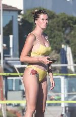 IRELAND BALDWIN in a Yellow Swimsuit on the Beach in Malibu 08/10/2020