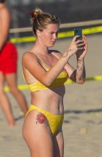 IRELAND BALDWIN in a Yellow Swimsuit on the Beach in Malibu 08/10/2020