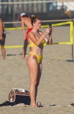 IRELAND BALDWIN in a Yellow Swimsuit on the Beach in Malibu 08/10/2020