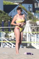 IRELAND BALDWIN in a Yellow Swimsuit on the Beach in Malibu 08/10/2020