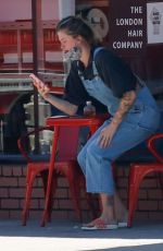 IRELAND BALDWIN in Denim Overalls Out for Iced Coffee in Los Angeles 08/10/2020