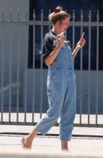IRELAND BALDWIN in Denim Overalls Out for Iced Coffee in Los Angeles 08/10/2020