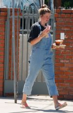 IRELAND BALDWIN in Denim Overalls Out for Iced Coffee in Los Angeles 08/10/2020