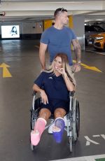 KATIE PRICE in Wheelchair Sat Selfridges in London 08/11/2020