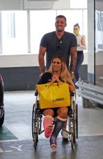KATIE PRICE in Wheelchair Sat Selfridges in London 08/11/2020