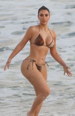 KIM KARDASHIAN in Bikini on the Set of KUWTK at a Beach in Malibu 08/26/2020