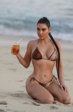 KIM KARDASHIAN in Bikini on the Set of KUWTK at a Beach in Malibu 08/26/2020