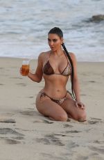 KIM KARDASHIAN in Bikini on the Set of KUWTK at a Beach in Malibu 08/26/2020