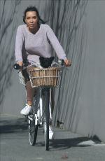 NATASHA CHERIE Out Riding Bike with Her Dog in Perth 08/22/2020