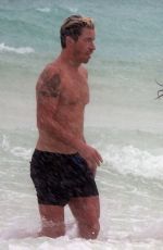 NINA DOBREV and Shaun White at a Beach in Tulum 08/21/2020