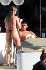 PERRIE EDWARDS in Bikini at a Boat in Spain 08/09/2020