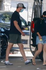 TIFFANI THIESSEN in Denim Shorts at a Car Wash in Los Angeles 08/12/2020