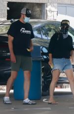 TIFFANI THIESSEN in Denim Shorts at a Car Wash in Los Angeles 08/12/2020