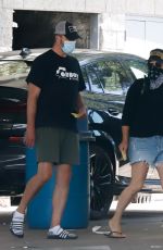 TIFFANI THIESSEN in Denim Shorts at a Car Wash in Los Angeles 08/12/2020